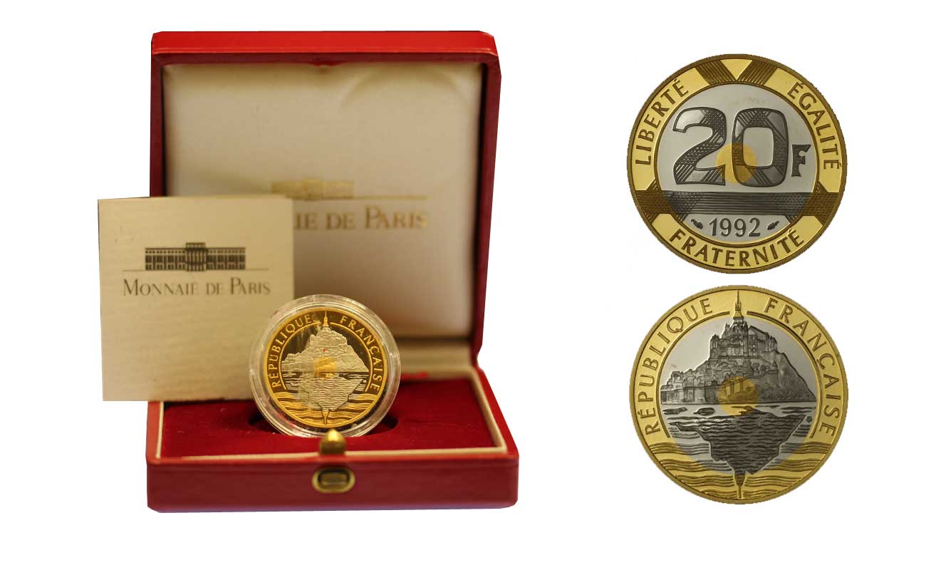 "Mont Saint-Michel" - 20 franchi gr. 16,46 in oro 920/000 nella corona e in oro 750/000 e palladio 150/000 nell'interno- conf. originale