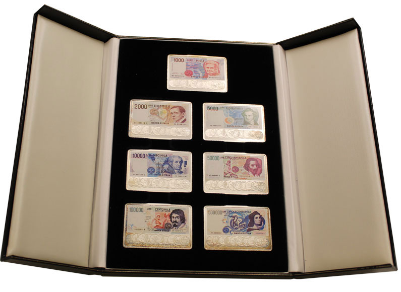 Lotto di 7 lingotti con raffigurazioni banconote in lire - gr. complessivi 217 in ag. 999/000 in confezione